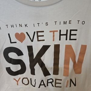 White Graphic Tee with Black and Orange Text